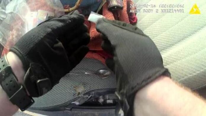 https___cdn.cnn.com_cnnnext_dam_assets_180928191132-officer-caught-on-body-cam-planting-drugs